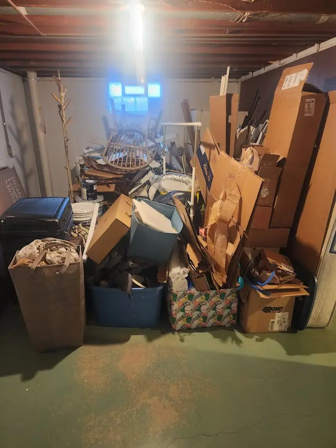 Roll-off dumpster container at job site for 2 Yard Dumpster Rental in Lewistown